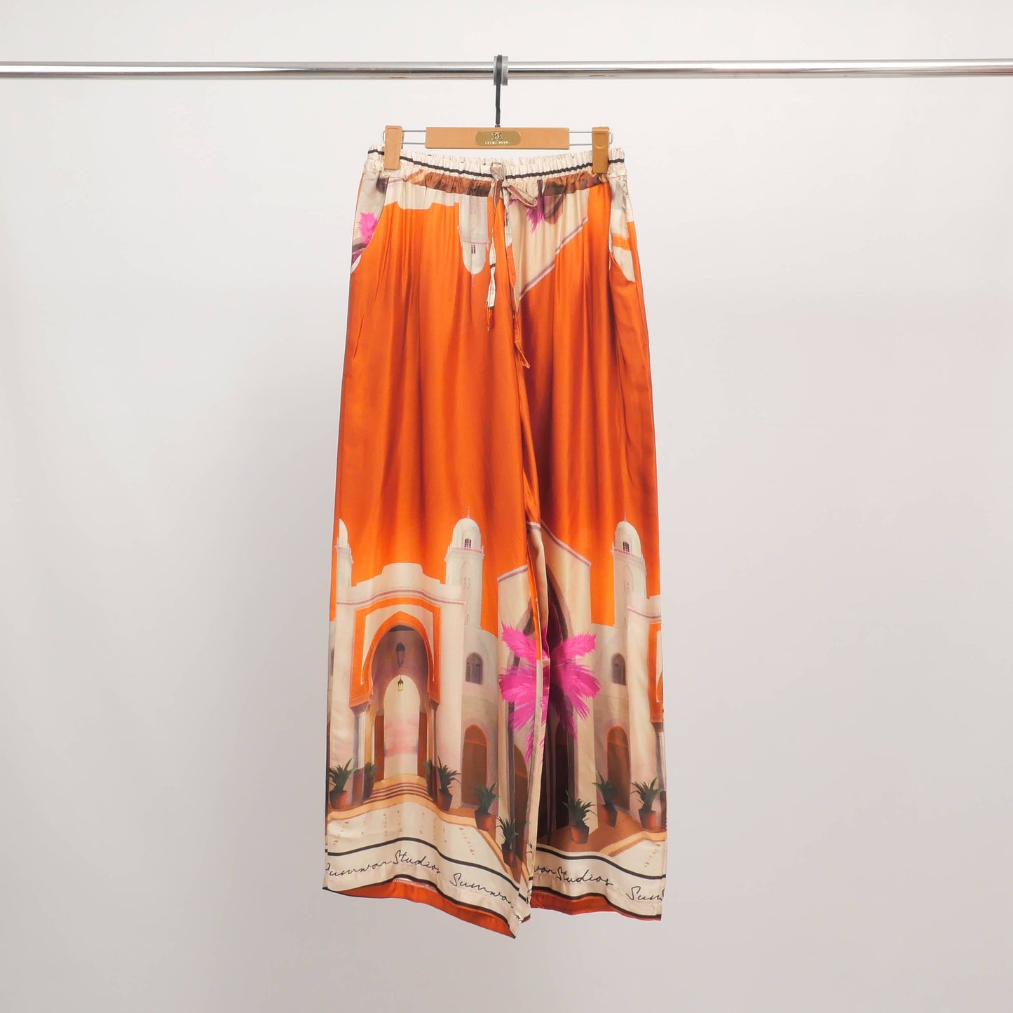 Wide pants with architecture print in Paprika: One size fits S to M